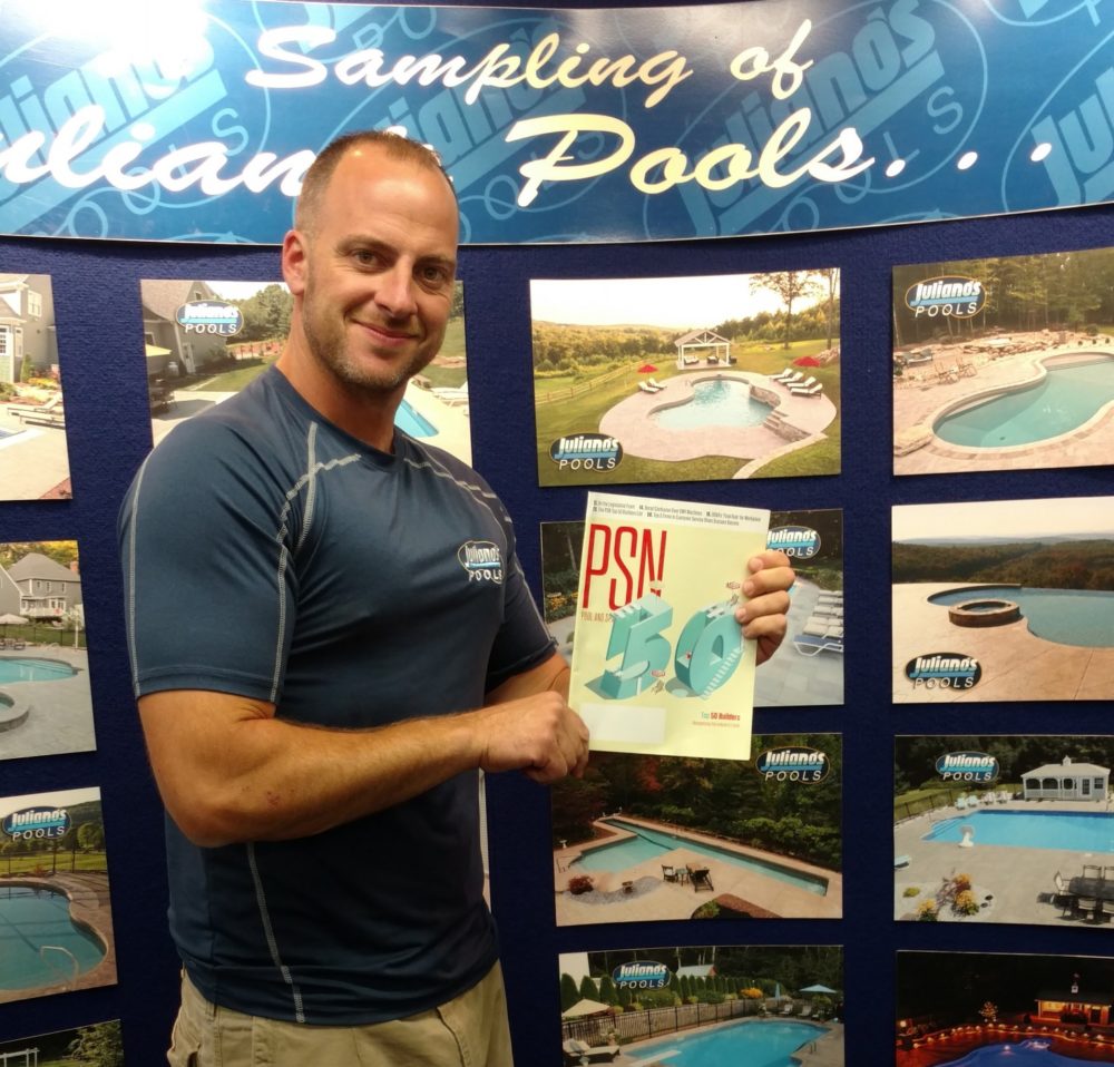 img_20160701_083344841 This is a photo of brian juliano with the top 50 pool builders award.