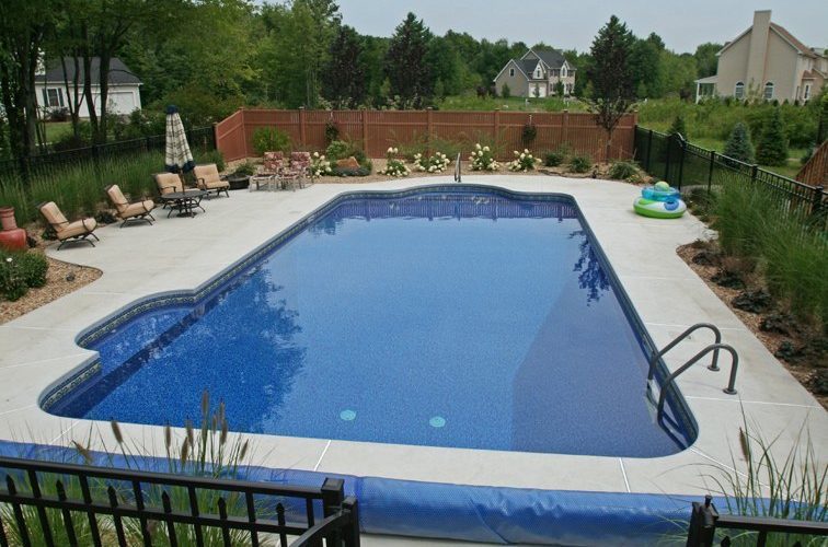 This is a photo of a patrician in ground pool with side step in West Stockbridge, MA